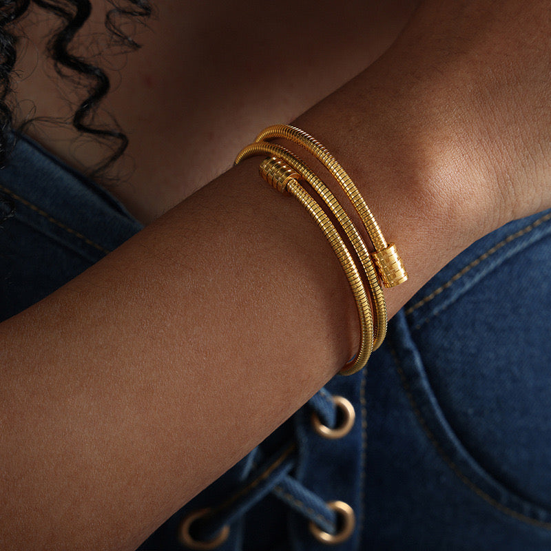 Swirla gold tone bracelet