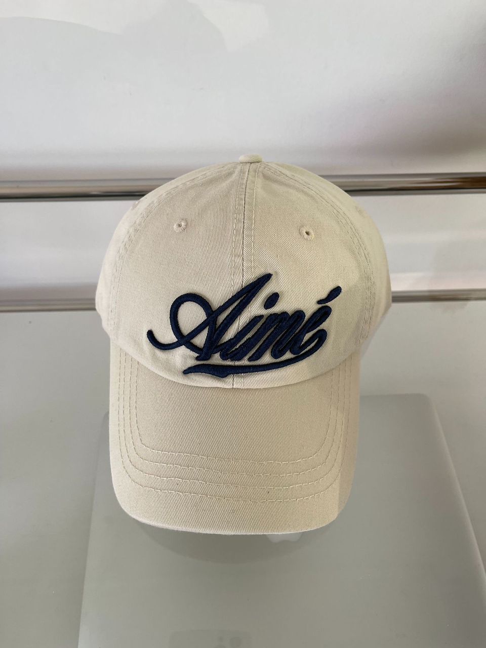 Aime signature curve cap